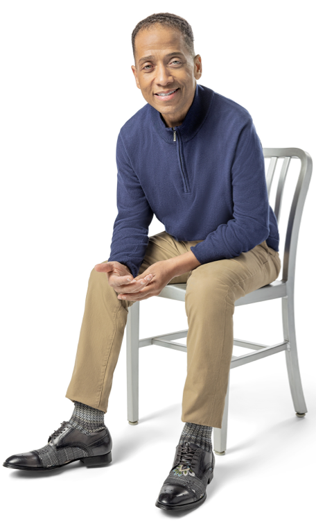 Patient Timothy sitting in a chair