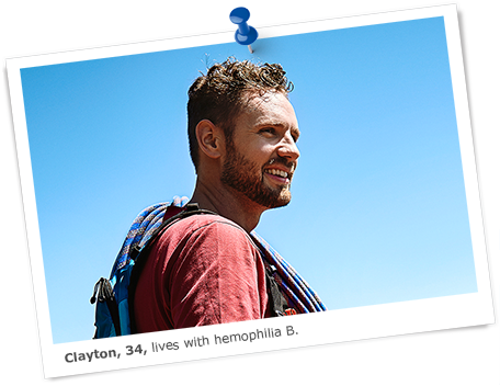 Image of Clayton, who lives with hemophilia B, against a blue sky